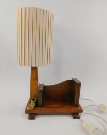 An early 20thC oak table lamp