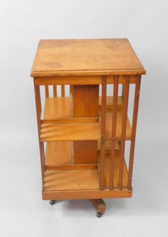 A Victorian oak two tier revolving bookcase