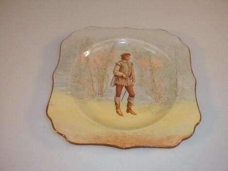 A Royal Doulton Falstaff plate of square form with a wavy brown rim