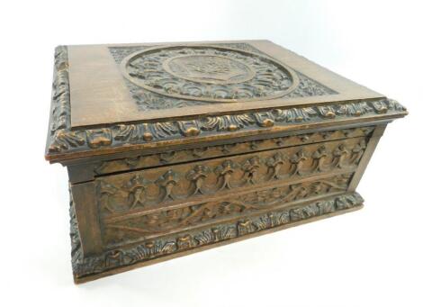 A Victorian gothic carved oak bible box