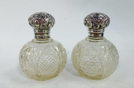 A pair of Victorian hobnail cut scent bottles