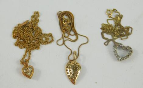 Three 9ct gold and diamond set pendants on chains