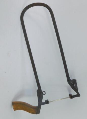 A Hobbier patent antique coping saw.