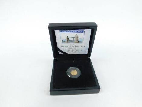 An Elizabeth II Diamond Jubilee gold quarter sovereign 2012