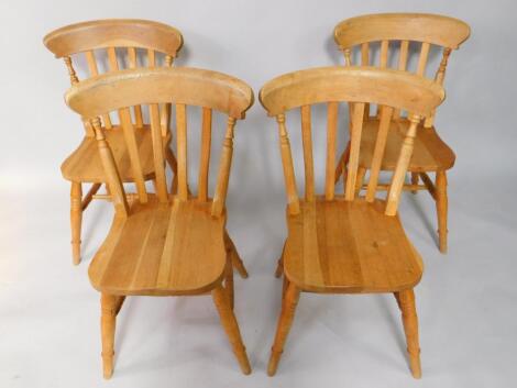 A set of Victorian style lathback four light oak kitchen chairs.