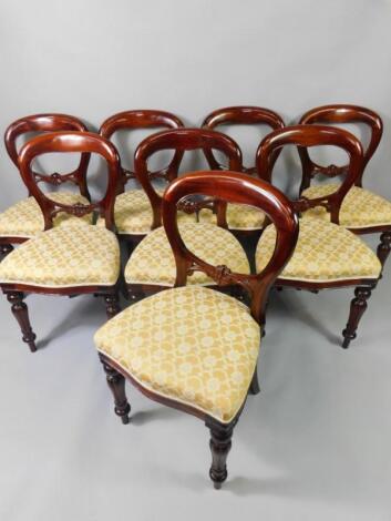 A set of eight Victorian style mahogany balloon back single dining chairs