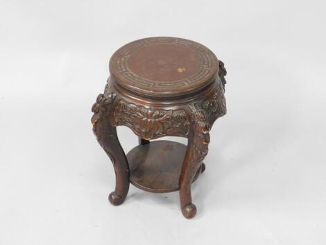 A late 19thC Chinese style lacquered wood urn stand