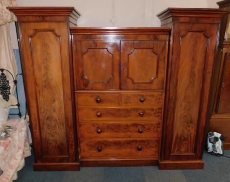 A Victorian figured mahogany wardrobe