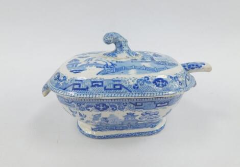 An early 19thC pottery blue and white sauce tureen