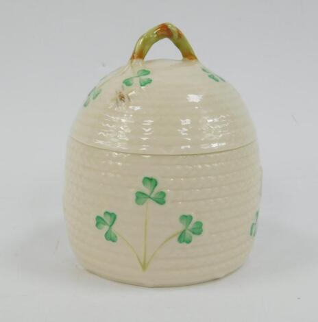 A Belleek porcelain honey pot