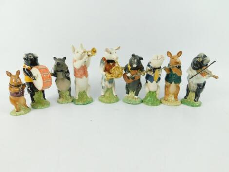 Nine Beswick pig band figures