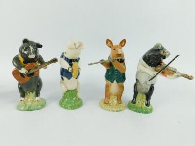 Nine Beswick pig band figures - 2