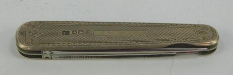 A silver backed pocket knife