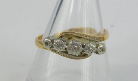 A diamond five stone ring