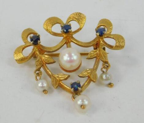 A 9ct sapphire and cultured pearl brooch