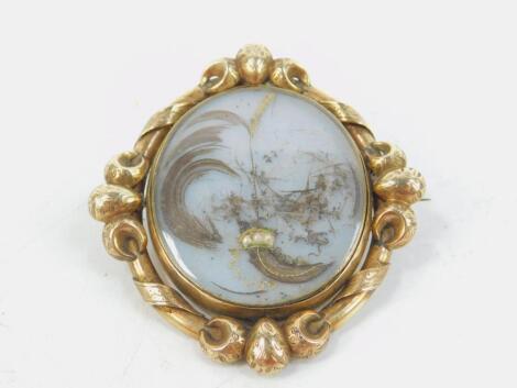 A Victorian hair locket mourning brooch