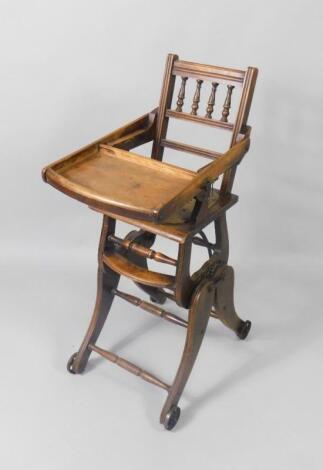 A Victorian beech and bentwood metamorphic child's high chair and rocker.