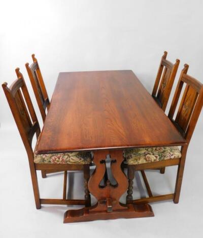 An Old Charm oak trestle dining table