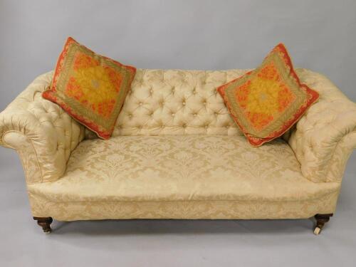 A Victorian oak Chesterfield two seater sofa