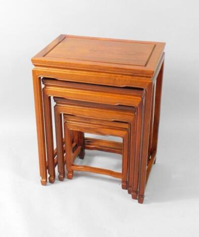 A Brights of Nettlebed Chinese style quartetto of hardwood occasional tables