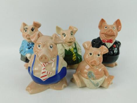 A set of Wade Nat West piggy banks. (5)