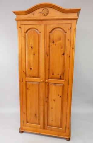 A pine double wardrobe