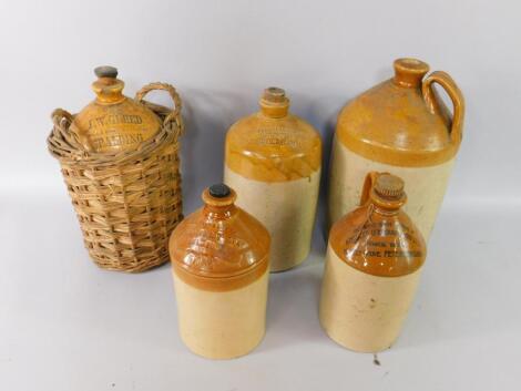 Four stoneware two tone wine and spirit jars