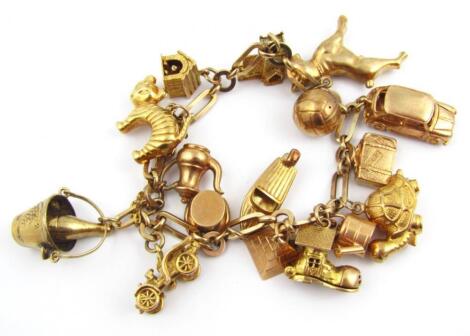 A 9ct gold fancy link charm bracelet