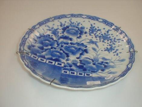 A 19thC Japanese blue and white charger