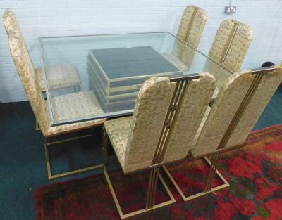 A 1970/80s gold coloured tubular dining table