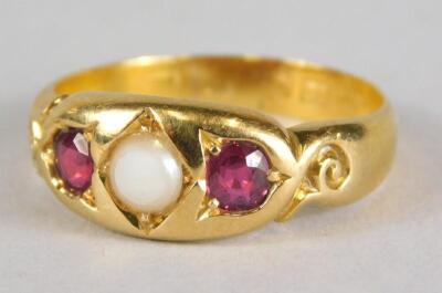 A 22ct gold ruby and pearl set gypsy ring