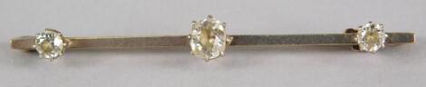 A diamond set bar brooch