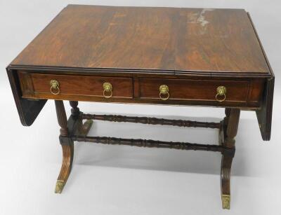 An early 19thC rosewood sofa table