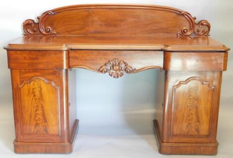 A Victorian mahogany pedestal sideboard