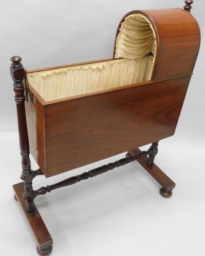 A 19thC mahogany child's cot