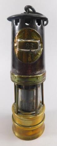 A late 19th/early 20thC brass and iron miner's lamp