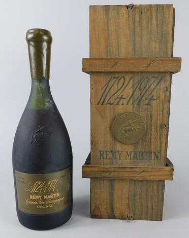 A bottle of Remy Martin Grand Fine Champagne Premier Cru cognac