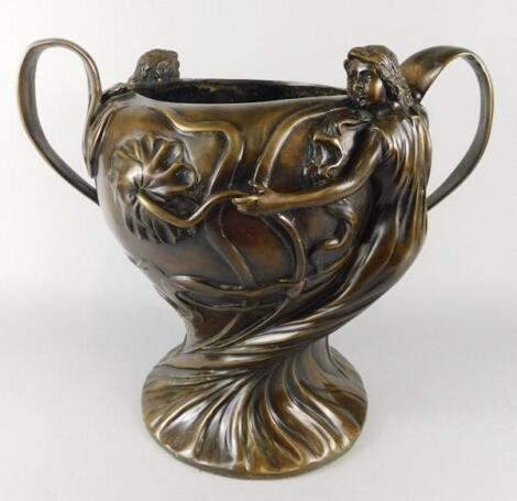 A large Art Nouveau style bronze two handled vessel