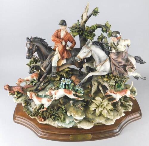 A Capodimonte style figure group titled Caccia Alla Volpe