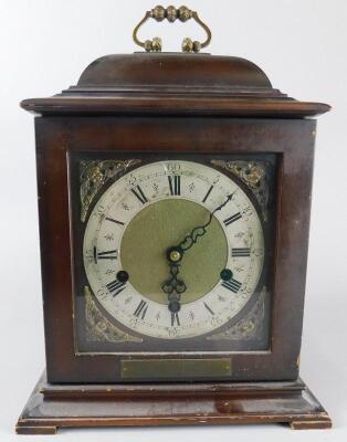 A mahogany cased mantel clock