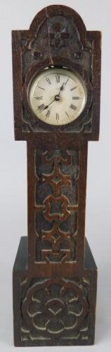 A late 19thC carved oak miniature long cased clock case