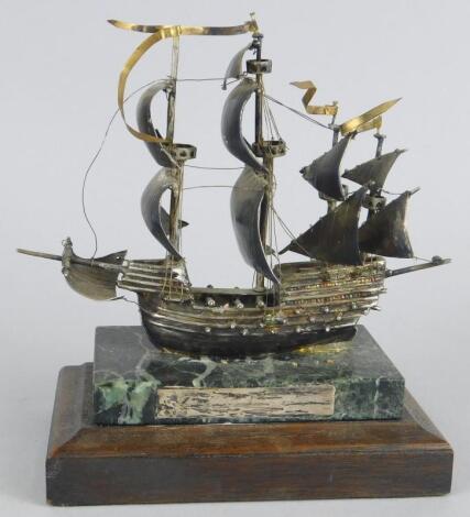 A late 20thC white metal model of the Mary Rose