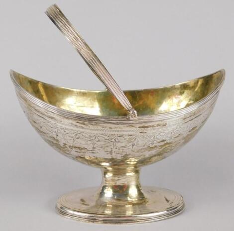 A George III silver oval boat shaped basket