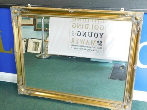 A rectangular gilt wall mirror