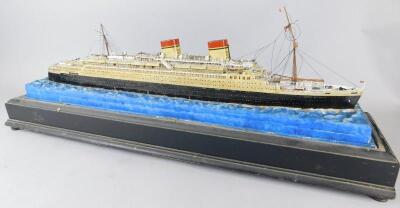 An elaborate scale model of a two funnelled cruise ship