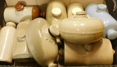 A collection of late 19th/early 20thC stoneware hot water bottles