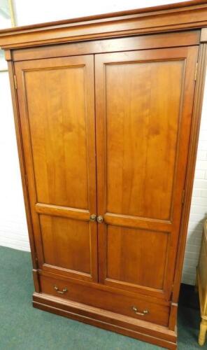 A French style cherrywood wardrobe or armoire