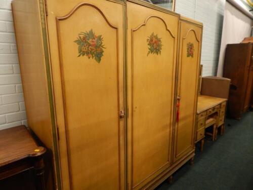 An early 20thC Continental triple wardrobe