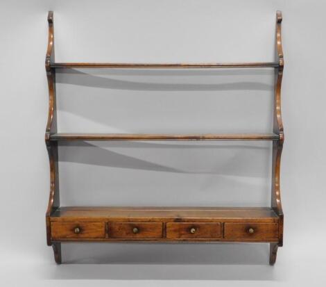 A fruitwood wall shelf