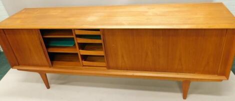 A 1960's/70's teak sideboard in the manner of G-Plan